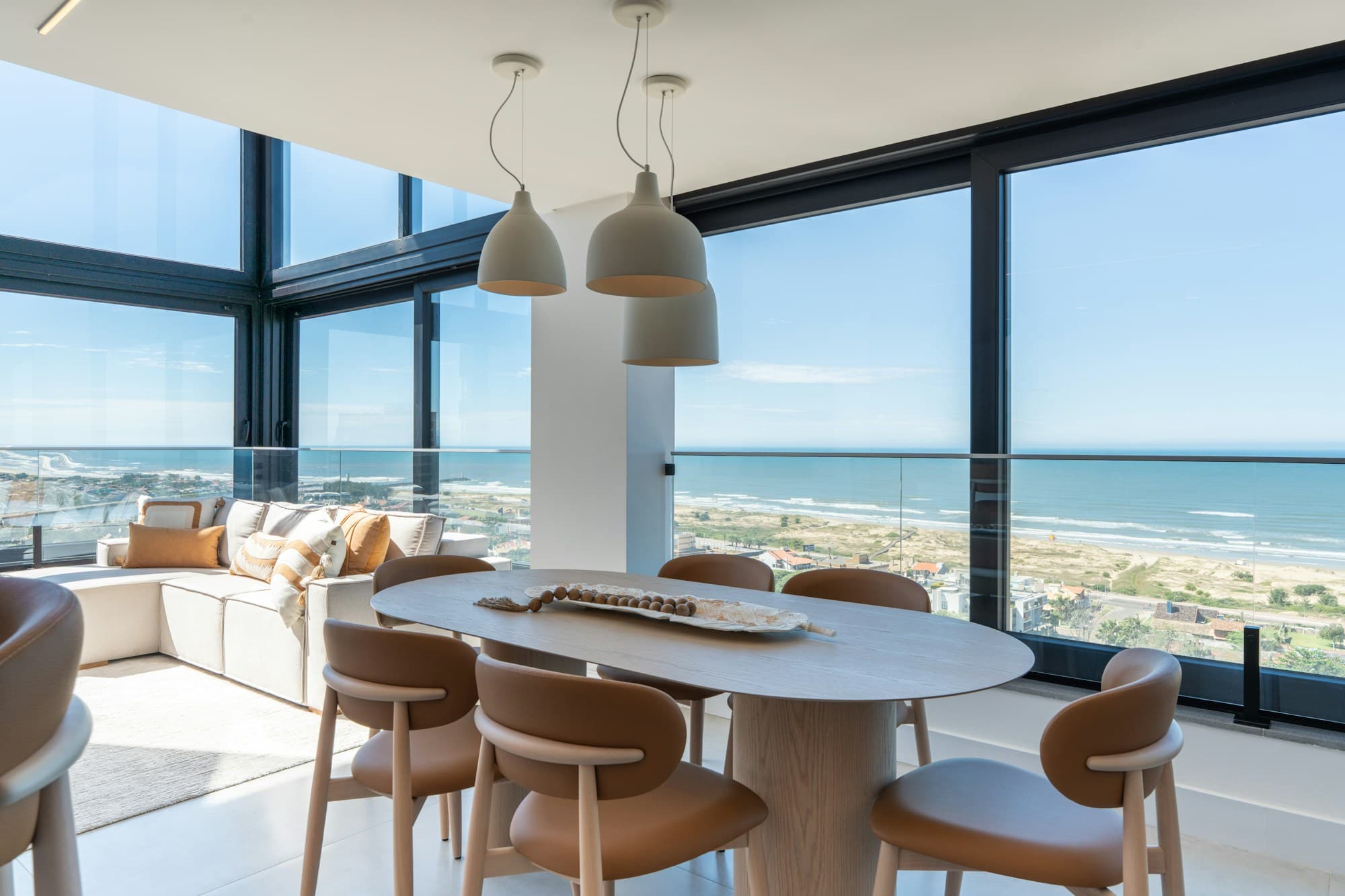 Bright apartment living room with a view over the water
